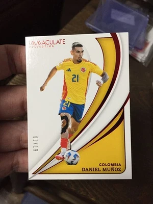 2024-25 Panini Immaculate Daniel Munoz Colombia Crystal Palace Ruby 1/19 ≈ 1/1 - Image 1 of 2