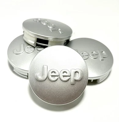JUEGO DE 4 TAPACUBOS CENTRALES DE RUEDA JEEP PLATEADOS 63 mm GRAND CHEROKEE WRANGLER COMPAS 2.50 Foto 1 de 3