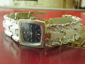 OROLOGIO DA DONNA ANNI '70 SVIZZERO ARGENTO AFFILATO SPECIALE BRACCIALE DONNA CARICA MANUALE 22 MM - Foto 1 di 21