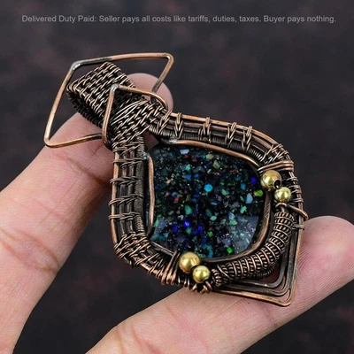 Joyería colgante de aniversario envuelto en alambre de piedra de ópalo etíope negro ovalado de cobre Foto 1 de 4