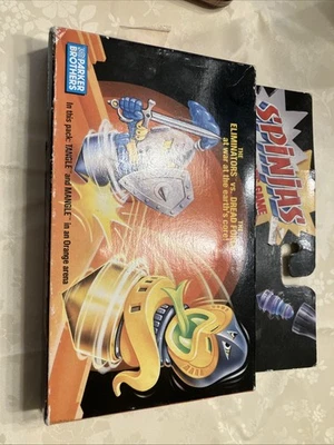 De colección 1987 Tomy Spinjas 2 lanzadores y 2 guerreros estuche naranja con espuma Parker Bros. Foto 1 de 2