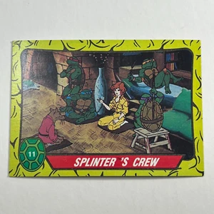1989 Topps TMNT Teenage Mutant Ninja Turtles #11 Splinter's Crew April O'Neil - Imagen 1 de 2
