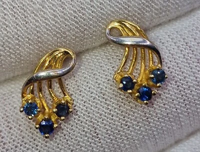 Brincos de ouro amarelo 9 quilates 1,06 g azul espinélio redemoinho torção 375 9 quilates acento branco - Imagem 1 de 4