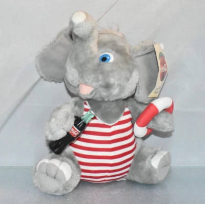 COCA COLA SITTING ELEPHANT WITH BOTTLE SOFT PLUSH TOY CARD TAGGED - Image 1 of 4
