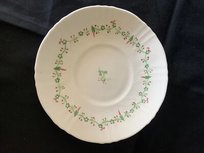 Platillo floral verde y rojo Foto 1 de 3