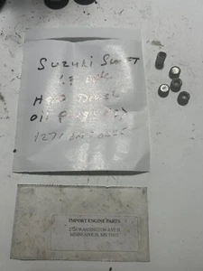 HEAD DOWEL/PLUGS *USED* FITS SUZUKI SWIFT 1.3 DOHC 1989-1994 NO OE NUMBER - Picture 1 of 2