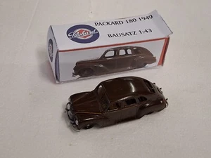 K-64 Bausatzmodell 1/43 Packard 180 (1949) dunkelbraun, gebaut OVP - Bild 1 von 5