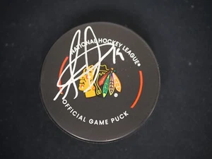 JONATHAN TOEWS SIGNED CHICAGO BLACKHAWKS OFFICIAL GAME PUCK BECKETT WITNESSED - Picture 1 of 2