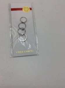 $40 Vince Camuto Silvertone Ring Set Of 4 Rings SZ 4,6,7,8 VC68 - Picture 1 of 4