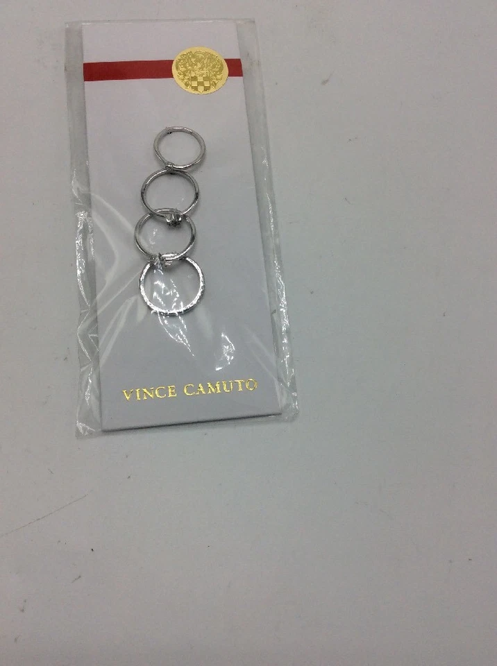 Vince Camuto Silvertone Ring Set of 4 Rings Sz 4 6 7 8 Vc68