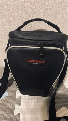 Bolsa de cámara triangular ZERO SHOCKIII para DSLR, negra, correa ajustable, usada Foto 1 de 4