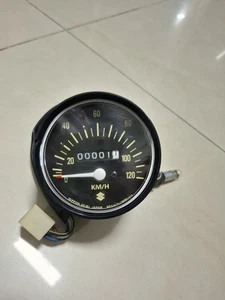VELOCÍMETRO SUZUKI A100-A80-RV90-GT100-TC100-TS100A-K-L-M KM/H GENUINO NOS JAPÓN - Imagen 1 de 8