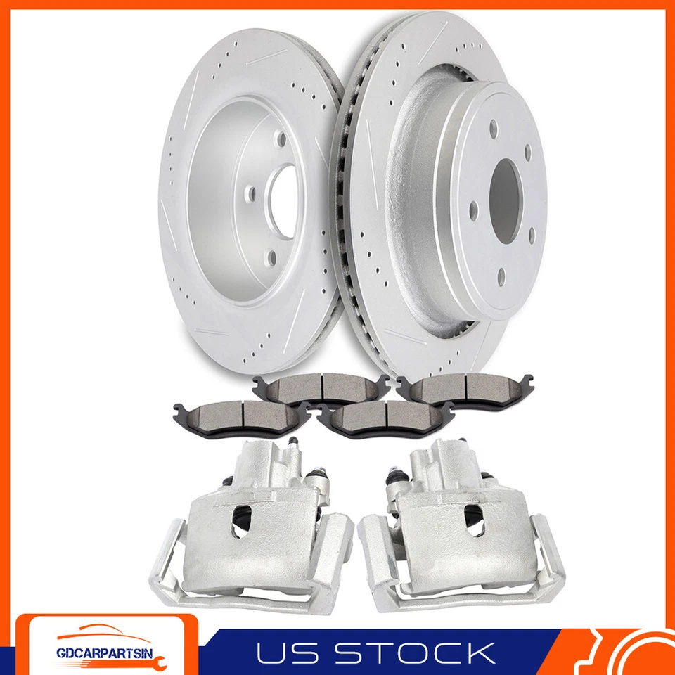 Pinzas de freno traseras rotores y pastillas de cerámica ranuradas para Dodge Ram 1500 2002-2010 Foto 1 de 4