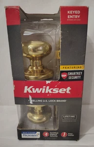 Perilla de puerta de entrada de latón pulido Kwikset Juno SmartKey - Imagen 1 de 9