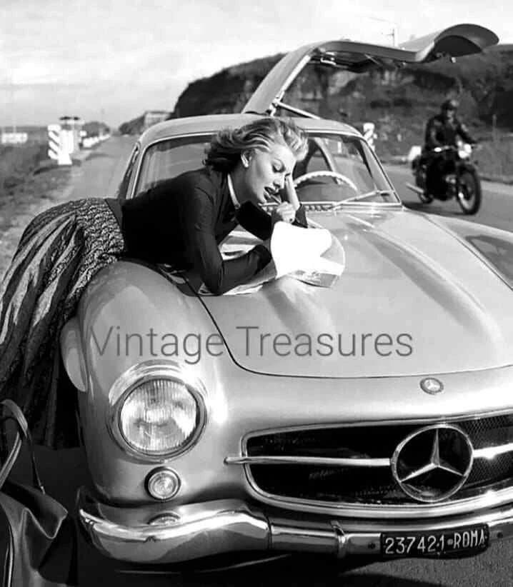 Sophia Loren with her  Mercedes-Benz  300 SL Photo Print Poster - Image 1 of 1