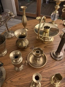 An Assortment Of Brass Pieces To Include Candlesticks, Vases, And Candelabra. - Picture 1 of 21
