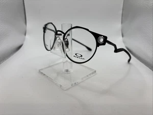 Occhiali da vista Oakley OX5141-0152 T 52/19 134 Deadbolt nero titanio ovale A3951 - Foto 1 di 24
