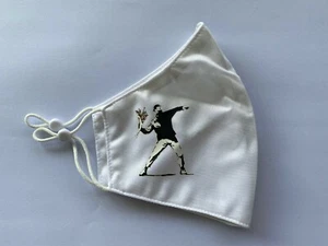 Banksy Demonstrant Wandbild Überwurf Blumen Totenkopf auf weiß Gesichtsmaske Nano-Polyester UK - Bild 1 von 2