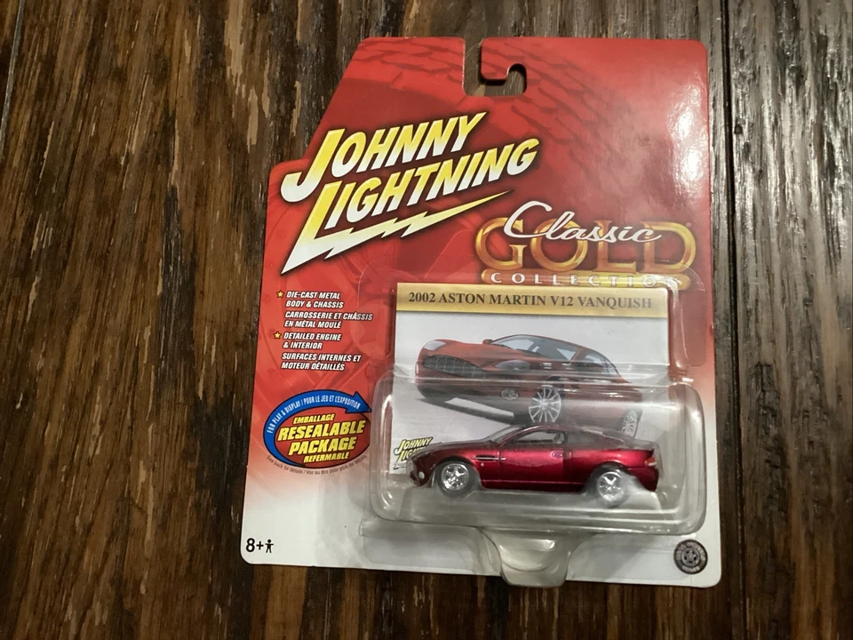 2002 Aston Martin V12 Vanquish Johnny Lightning Classic Gold Collection 1 64
