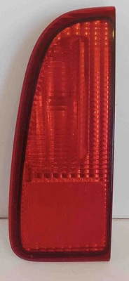 Navegador 2000 tapa derecha montaje luz trasera usada OEM Foto 1 de 4