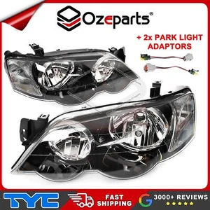 TYC Pair LH+RH Head Light Lamp + Adapter For Ford Falcon BA BF XR XR6 XR8 FPV - Picture 1 of 7