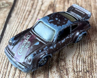 Литой винтажный спортивный автомобиль ERTL Porsche 930 Turbo The Cannonball Run коричневый масштаб 1:64 - Изображение 1 из 4