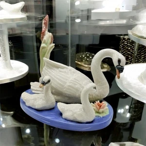 Porcelain figurine titled 'Swan Family' by Cascade - Picture 1 of 8