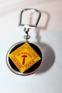 Porte clé BOURBON TAP TITE GOBIN DAUDE Vis Paris Keychain inclusion - Picture 1 of 2