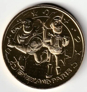 A- 2025 TOKEN MEDAILLE MONNAIE DE PARIS -- 77 N°67 BUZZ L'ECLAIR / WOODY - Picture 1 of 2