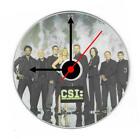 C.S.I. Série TV. Horloge CD. Avec stand libre.