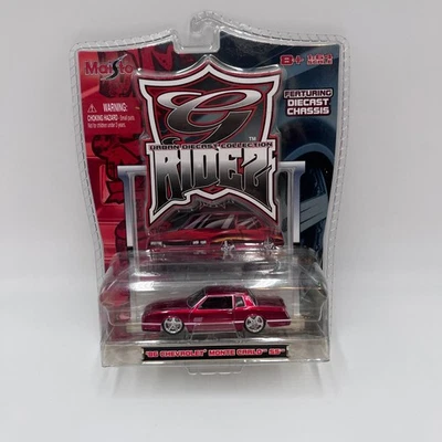 Chevrolet Monte Carlo SS Maisto G Ridez 86 rojo escala 1:64 embalaje amarillento Foto 1 de 4