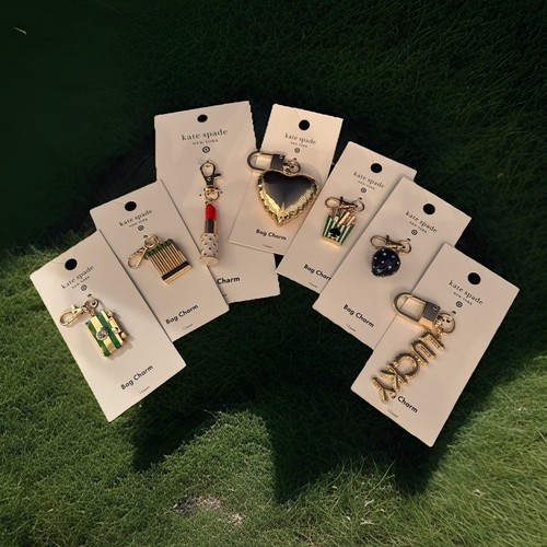 Kate Spade new york x borsa bersaglio charm set di 7 fiammiferi fotocamera rossetto cuore ++