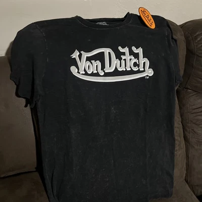 Von Dutch vintage-style black t-shirt with a winged flying eyeball graphic LARGE - Image 1 of 3