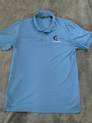 Camisa Polo Travis Mathew Para Hombre Rendimiento Medio Lacrosse CBA Azul Foto 1 de 4