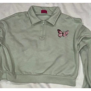 Nicola Bee Sudadera Corta Polo 1/4 Cremallera Nueva York Estampado Mariposa Verde Talla S - Imagen 1 de 6