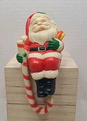 Vintage Christmas Santa Stocking Hanger Shelf Sitter Candy Cane Hard Plastic - Image 1 of 4