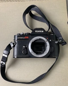 Appareil photo reflex argentique 35 mm Konica Autoreflex T4 pièces/réparation du corps noir - Photo 1/7