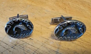 Gemelos vintage Sarah Coventry ovalados tono plata pescado  - Imagen 1 de 4