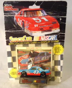 RACING CHAMPIONS RICHARD PETTY 1/64 STP #43 NASCAR RACE CAR ON DAMAGED CARD - Picture 1 of 3