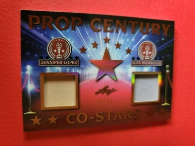 JENNIFER LOPEZ ALEX RODRIGUEZ WORN RELIC CARD #d56/85 2019 LEAF PROP CO-STARS  - Image 1 of 2