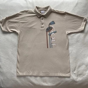 Polo de golf con gráfico de yunque para hombre L Spellout club de golf ropa de calle preparación - Imagen 1 de 15