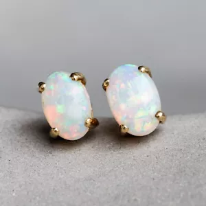 Oval Natural Australian Crystal Solid Opal Stud Earrings in 14k Yellow Gold  - Picture 1 of 12