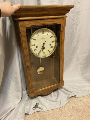 Vintage Hanging New England Clock Company grandfather clock, winding key, chime Cover