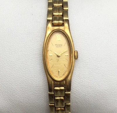 Винтажные женские часы Pulsar 12 мм золотистый овальный циферблат V220-5A50 новый аккумулятор 7,25 дюйма - Изображение 1 из 4