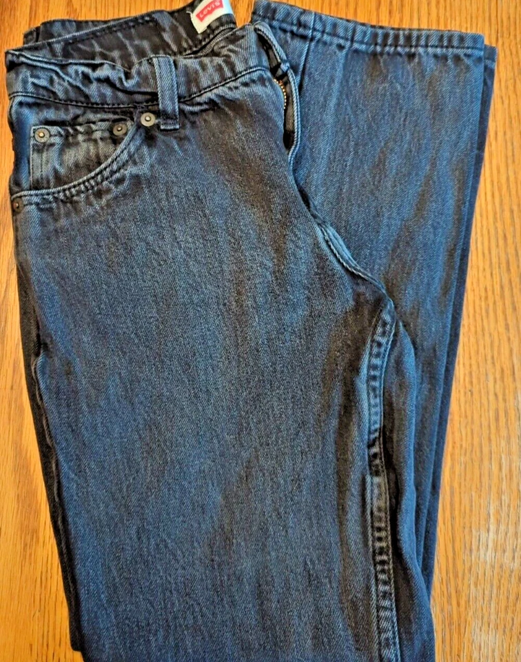Jeans Levi’s 502 Regular Taper Talla 14 Reg 27x27 Negro Rojo Pestaña Usados en Excelente Condición Foto 1 de 4