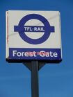 PHOTO  TFL RAIL FOREST GATE A TFL RAIL SIGN HAS REPLACED THE NATIONAL RAIL SYMBO