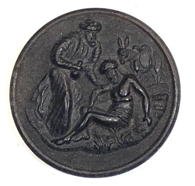 SCARCE black dyed molded horn button with self shank of the “Good Samaritan.” - Image 1 of 2