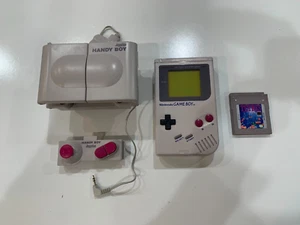 Sistema portátil Nintendo Game Boy Launch Edition gris + Handy Boy + ¡Juego Tetris! - Imagen 1 de 21