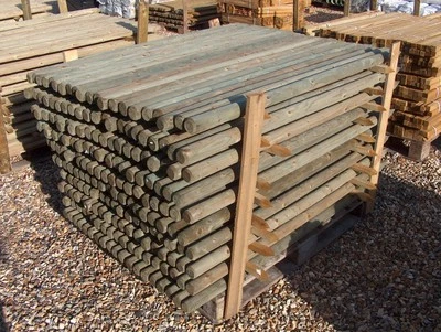 50 x Wooden Fence Posts 1.2m tall x 50mm diameter pressure treated wood - Image 1 of 4