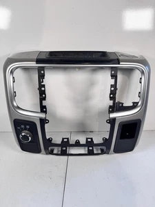 2013-2018 DODGE RAM 1500 2500 3500 RADIO DASH BEZEL CENTER TRIM JUMPSEAT *DMG* - Picture 1 of 10